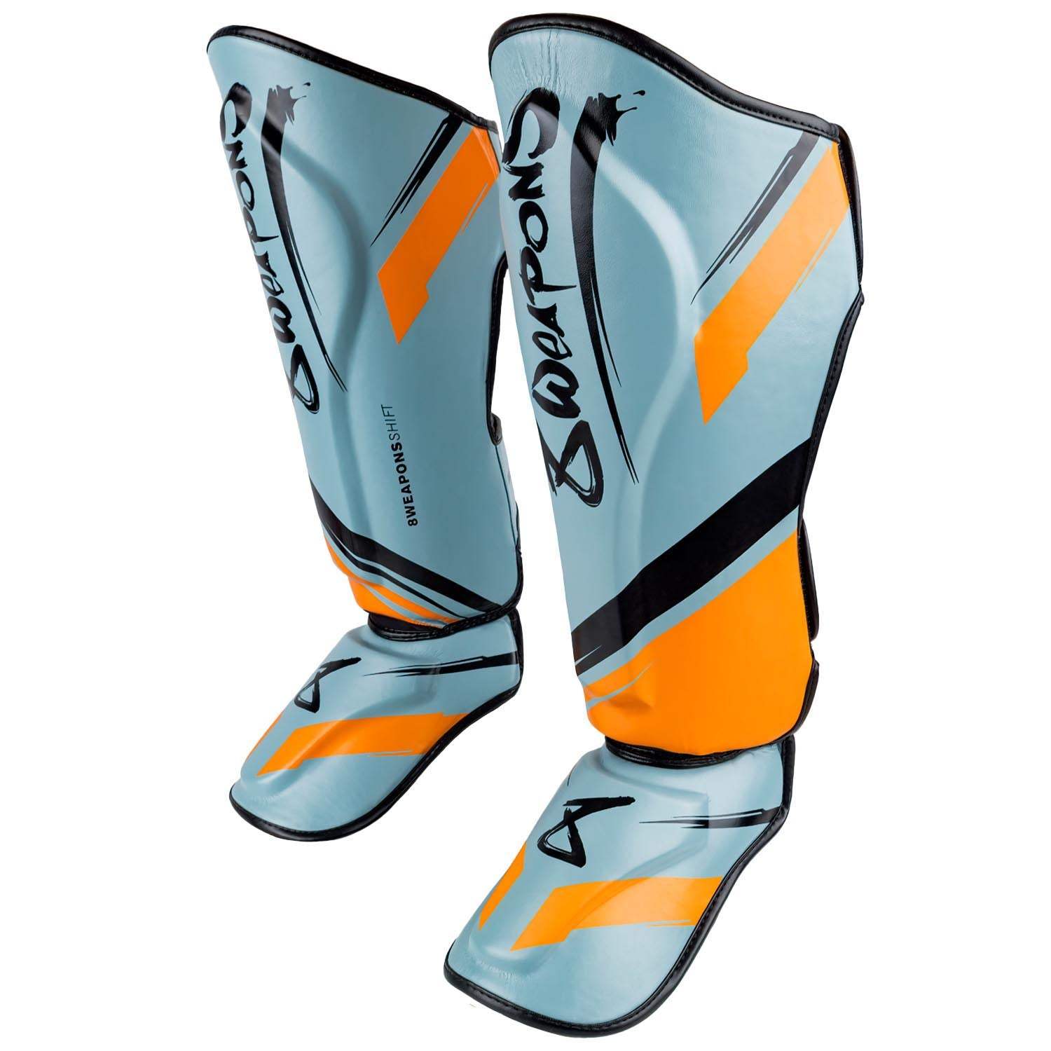 Protège-tibias 8 WEAPONS Shift gris glacé et orange avec mousse haute densité et bandes auto-agrippantes pour sports pieds-poings
