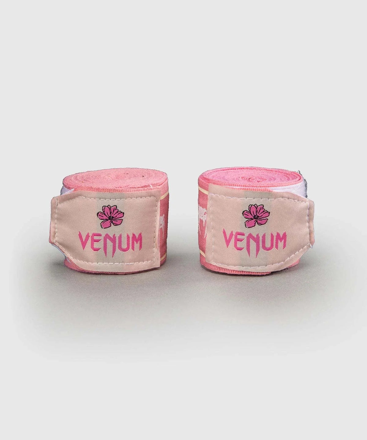Bandes de boxe Venum Impact rose bonbon pour maintien poignet et confort entraînement