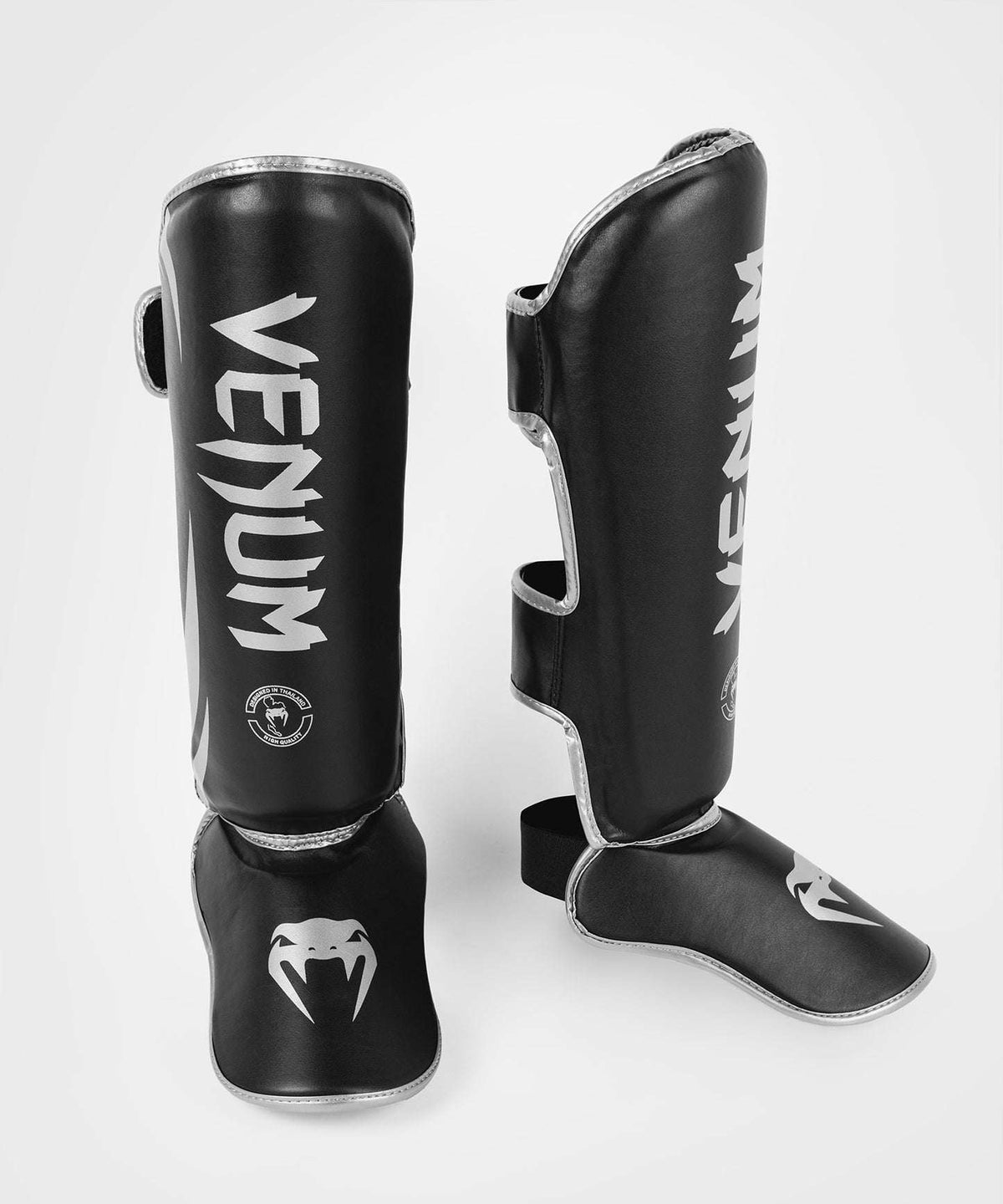Protège-tibias Venum Challenger noir et argent avec mousse haute densité pour Muay Thaï, kickboxing et MMA.