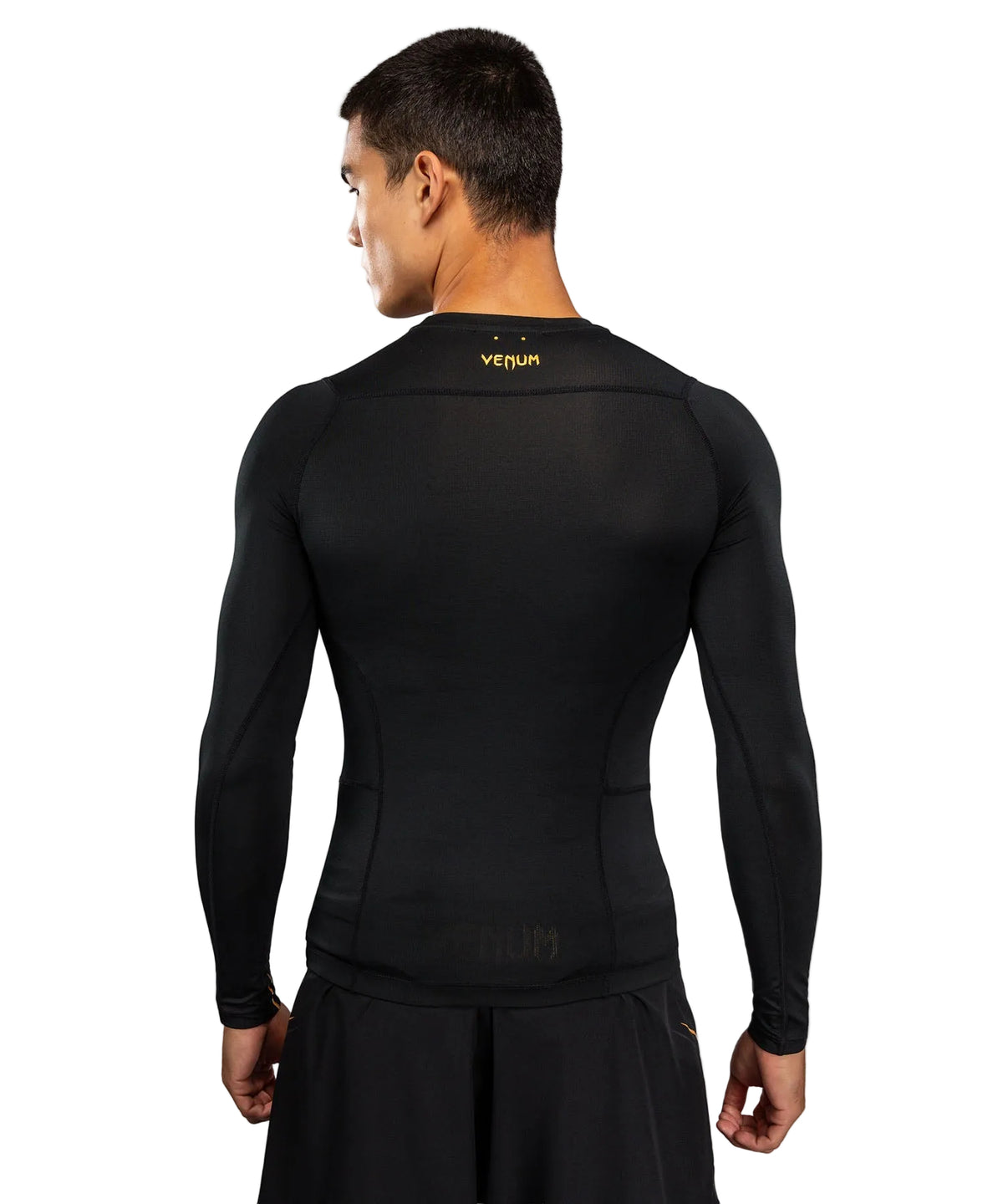 Rashguard Manches Longues Venum G-Core Noir/Or disponible à la Boutique des Arts Martiaux