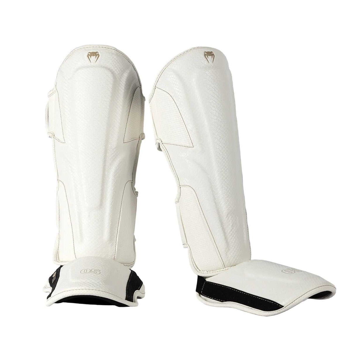 Protège-tibias Venum Impact Evo Scales ivoire en cuir Skintex avec mousse multi-densité pour boxe thaï et MMA