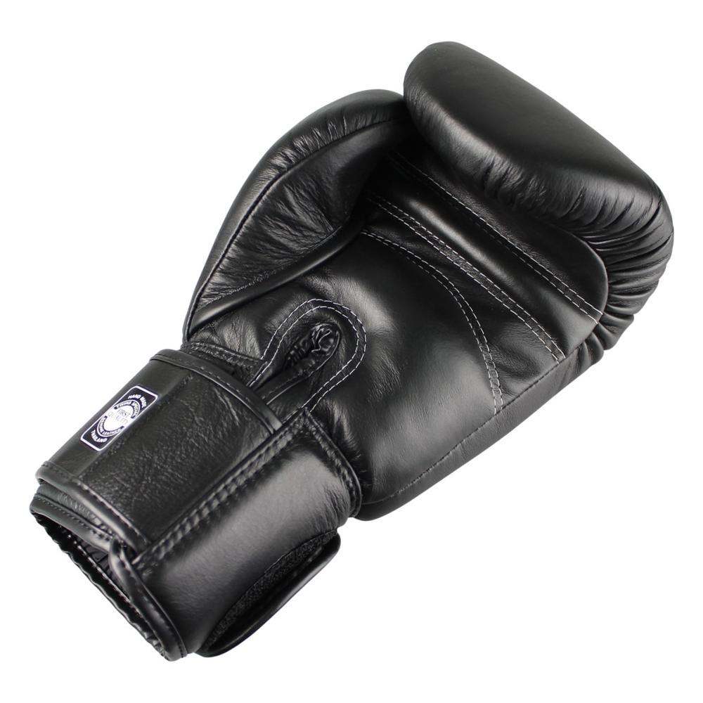 Black genuine buffalo leather Muay Thai boxing glove Twins BG-N with dense foam padding and Velcro wrist strap.