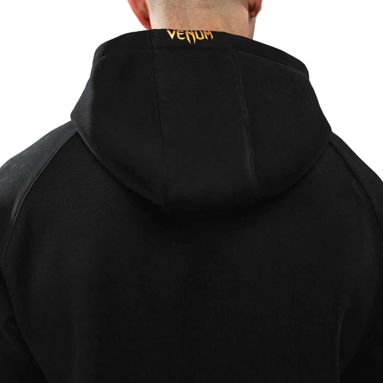 Hoodie Venum UFC Zenith Replica noir et or design premium pour MMA et entraînement