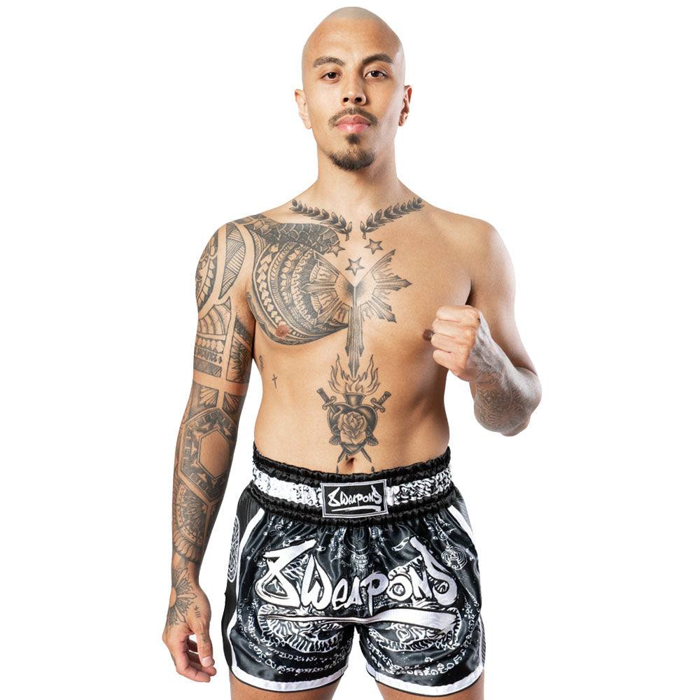 Short de Muay Thaï noir avec motifs tigres Sak Yant pour performance et confort optimal
