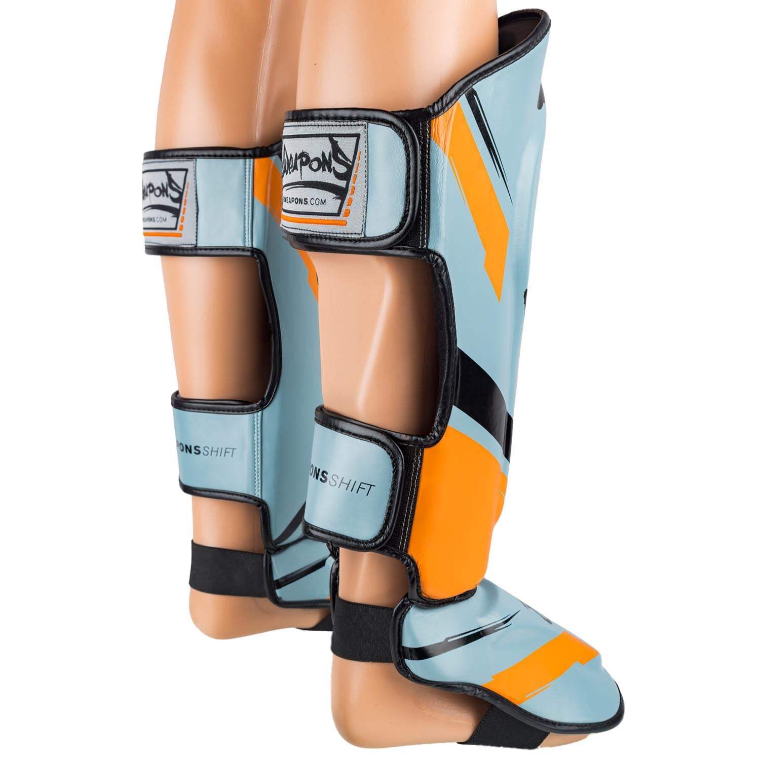 Protège-tibias 8 WEAPONS Shift gris glacé orange ergonomique pour sports pieds-poings