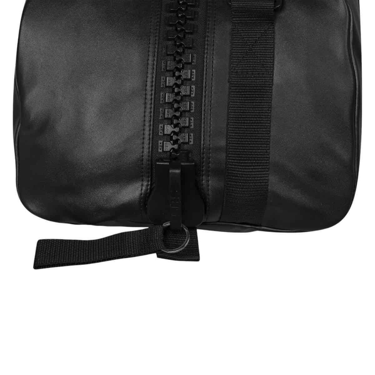 Black Adidas Combat 2-in-1 training bag with large zipper and adjustable strap