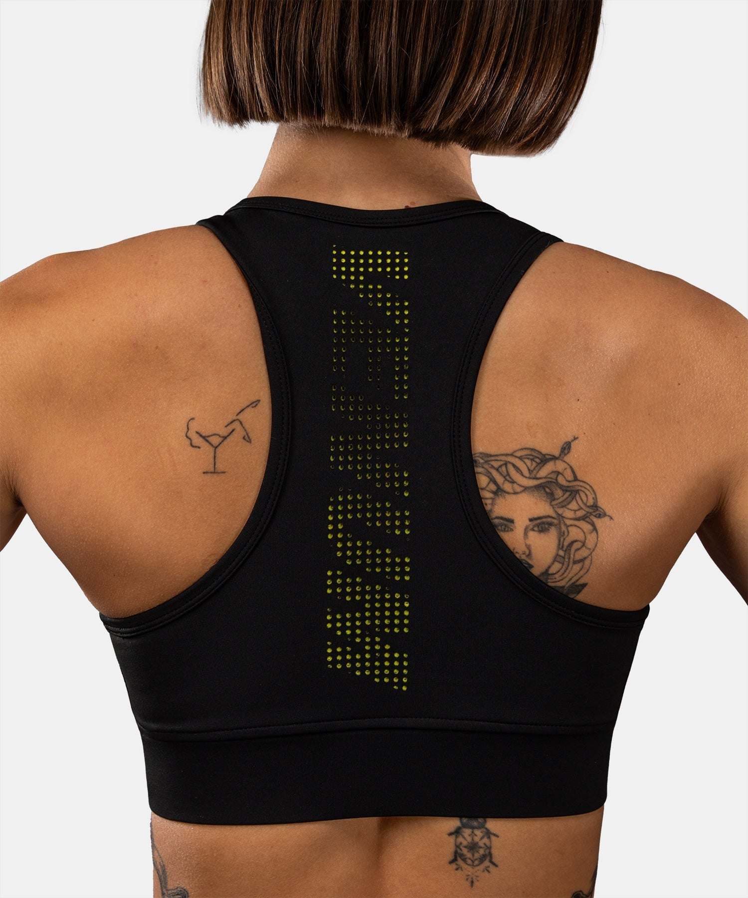 Brassière de sport Venum Lazer noir et jaune, maintien stable et confort pour entraînement intense