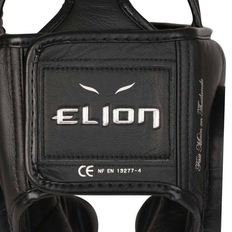 Black Elion boxing headgear made of top Thai leather, featuring durable stitching and ergonomic design for optimal comfort and protection.