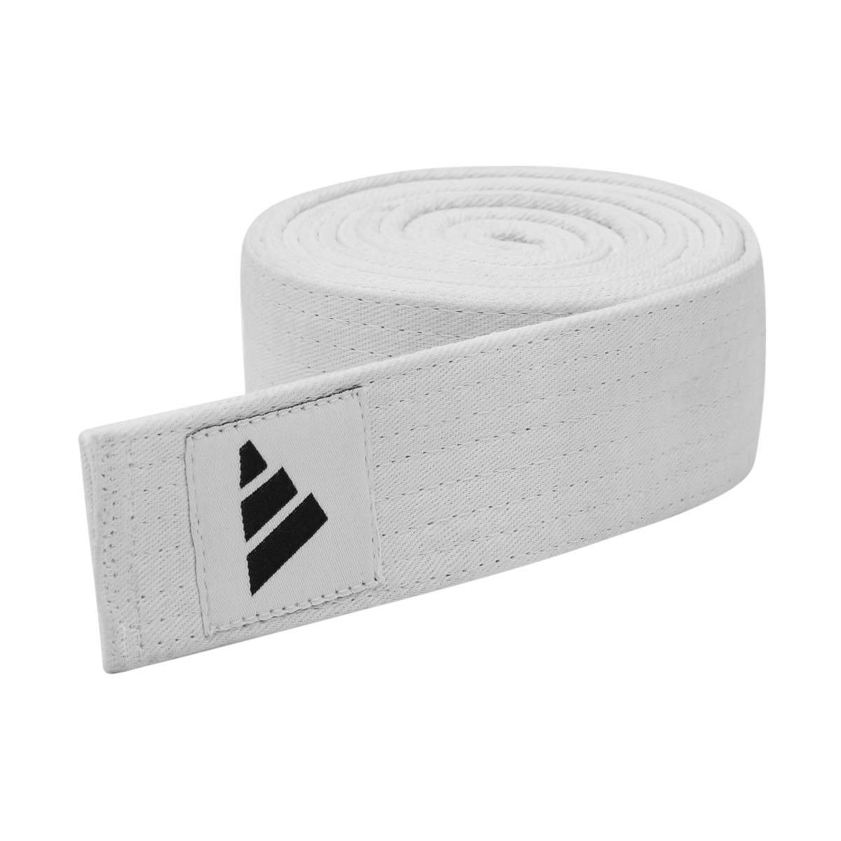 White Adidas martial arts belt with logo, durable cotton fabric, rolled design for judo and karate practitioners.