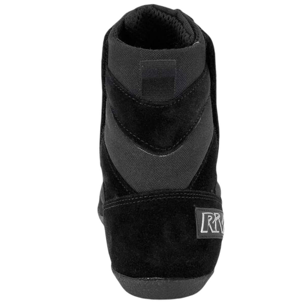 Chaussures de boxe française Rivat F1, noires, vue arrière, stabilité et confort pour compétiteurs, protection pied et cheville.
