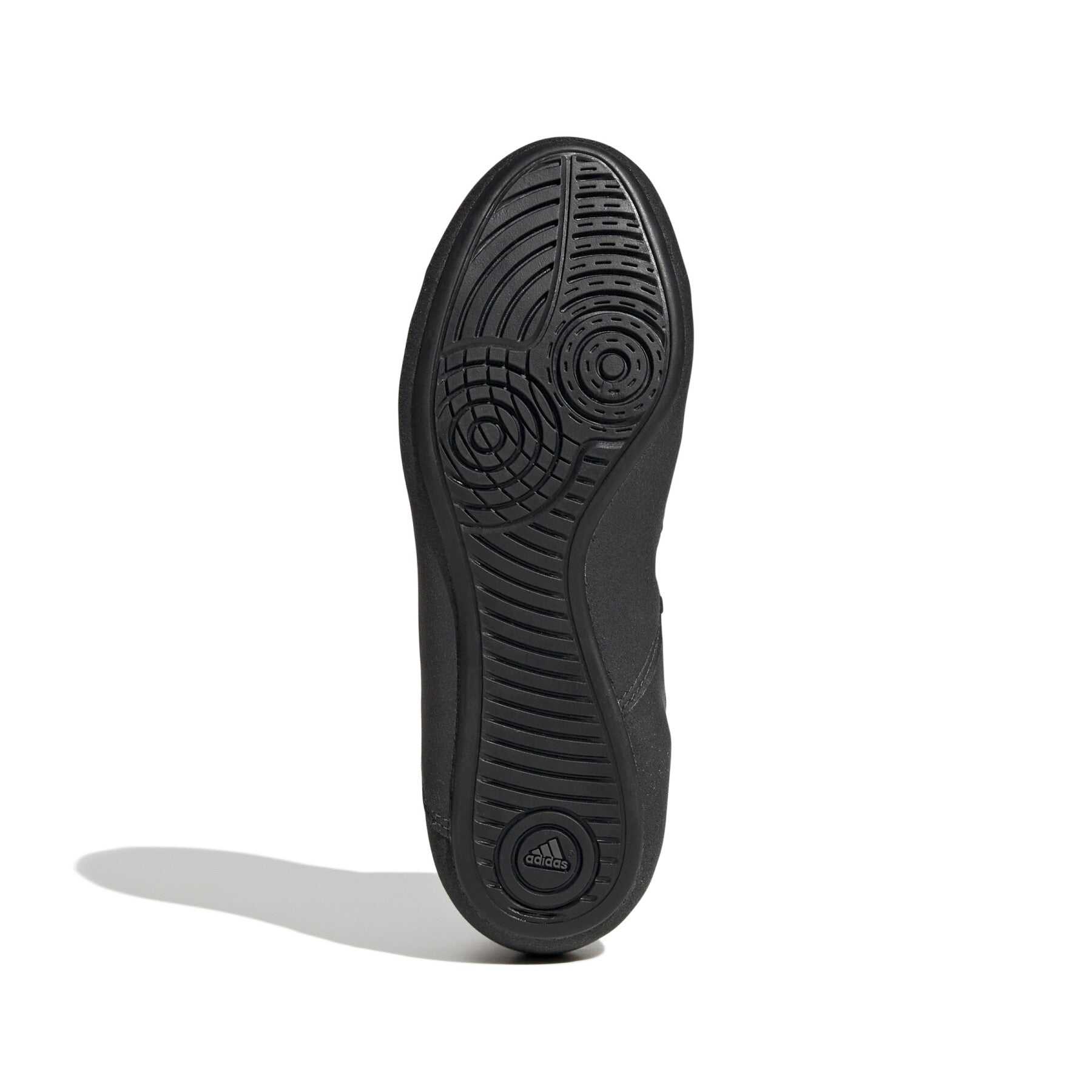 Sole view of black Adidas HVC wrestling shoes for junior boys with grip pattern for optimal performance