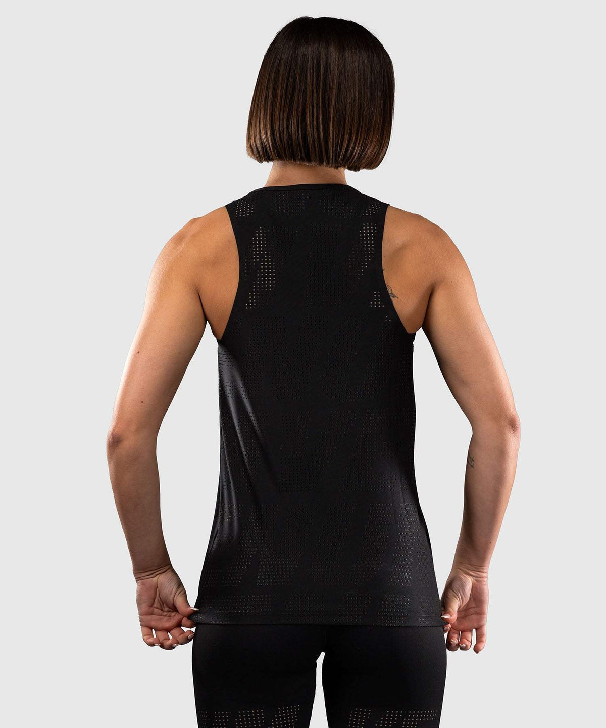 Débardeur femme Dry Tech Venum Lazer noir et jaune, coupe slim respirante pour fitness et training