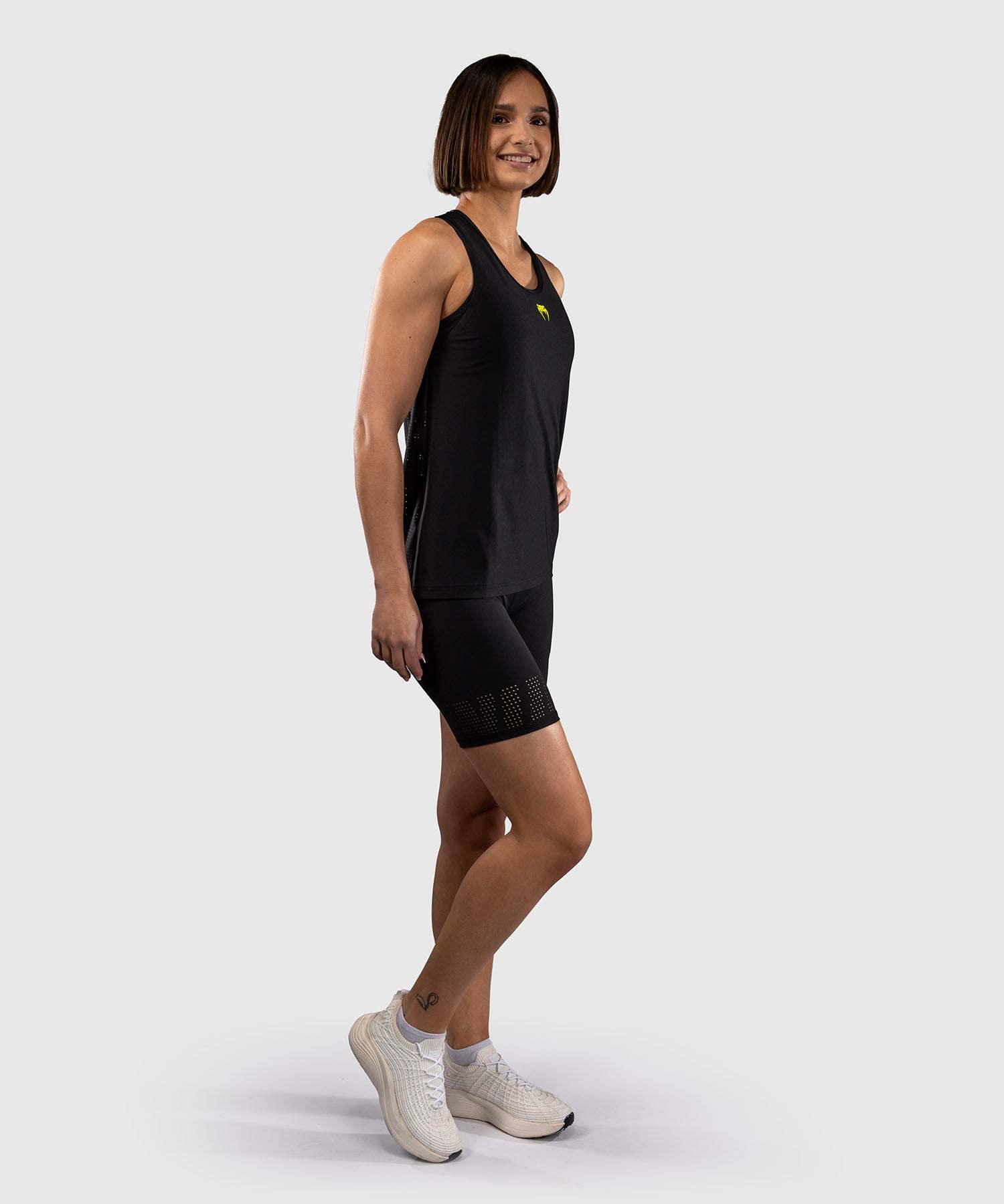 Débardeur femme Dry Tech Venum Lazer noir jaune respirant slim fitness training
