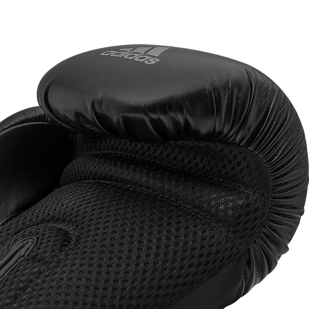 Black and gray Adidas Speed Tilt 150 training boxing gloves with breathable mesh and durable PU material