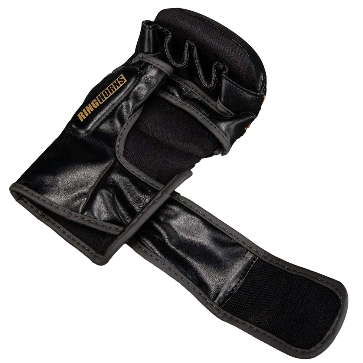 Protège-tibias Venum noir et or pour muay-thaï et kick-boxing avec fermeture velcro et mousse absorbante
