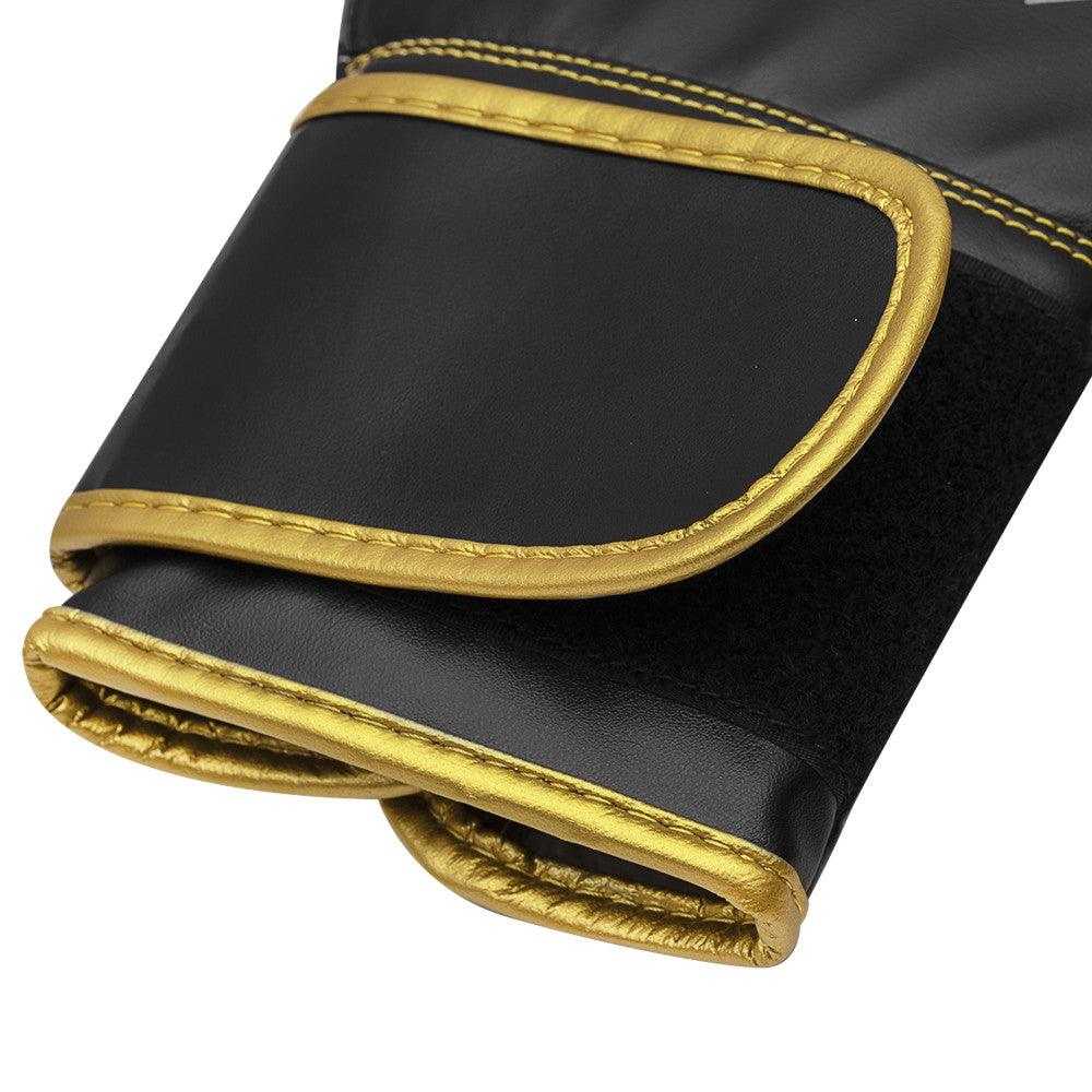 Black and gold Adidas Hybrid 80 boxing gloves with durable PU material and secure velcro closure