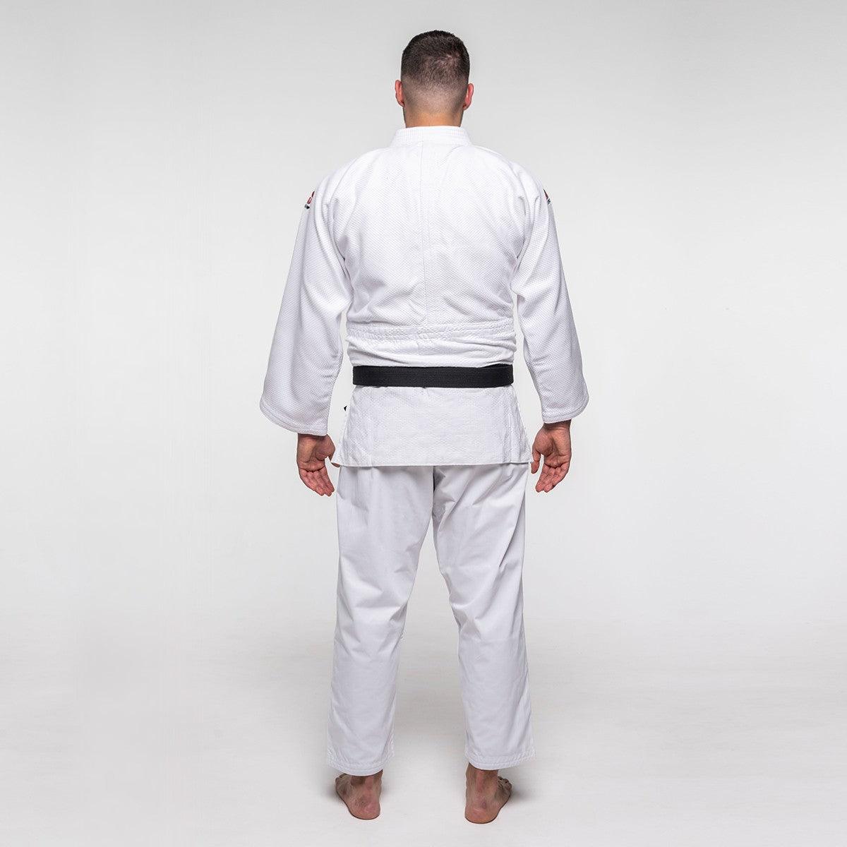 Back view of a man wearing white Judo Gi ProWear 2 with black belt on plain background