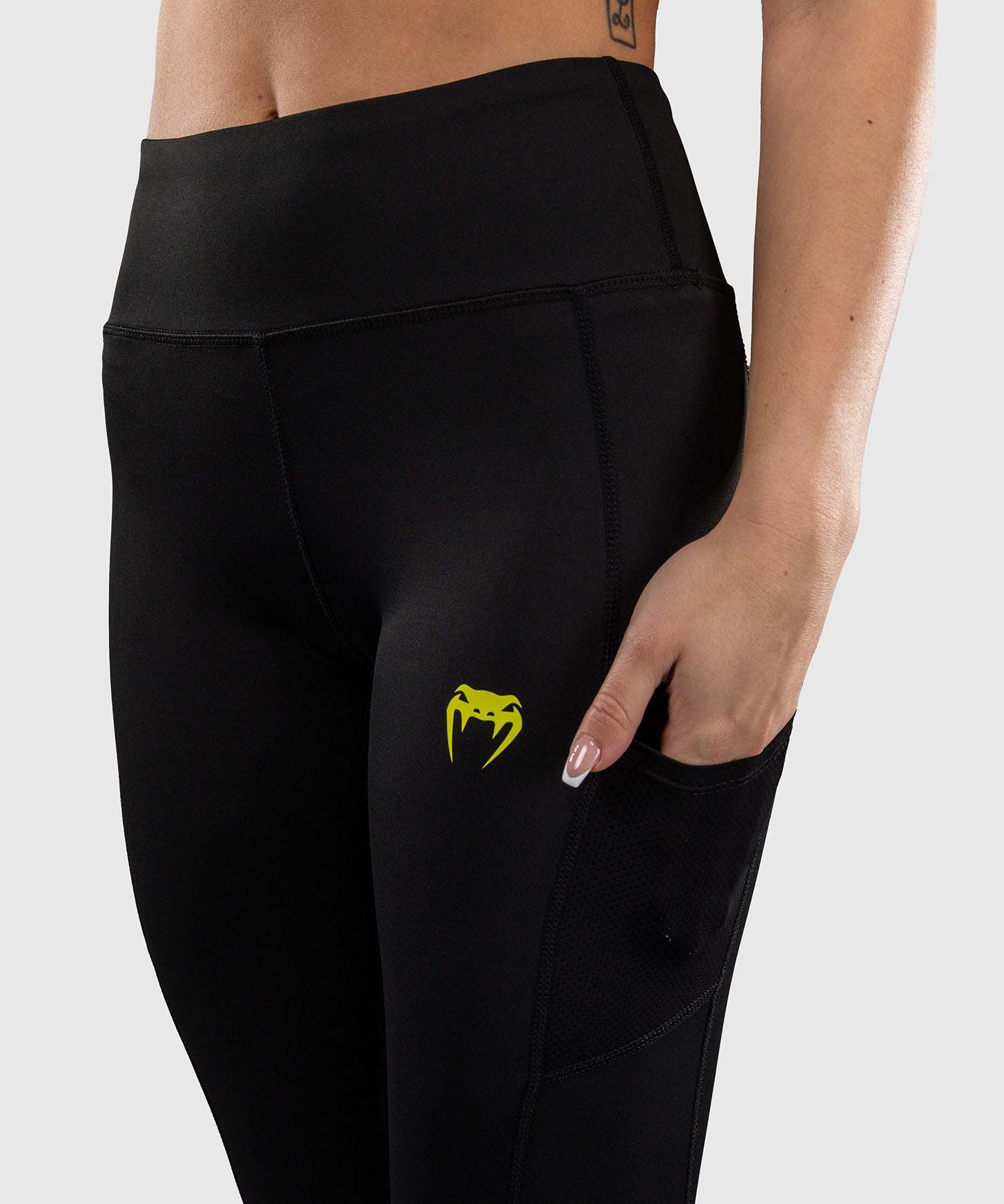 Legging Venum Lazer noir et jaune pour femme, compression et maintien optimal pour entraînement MMA et grappling