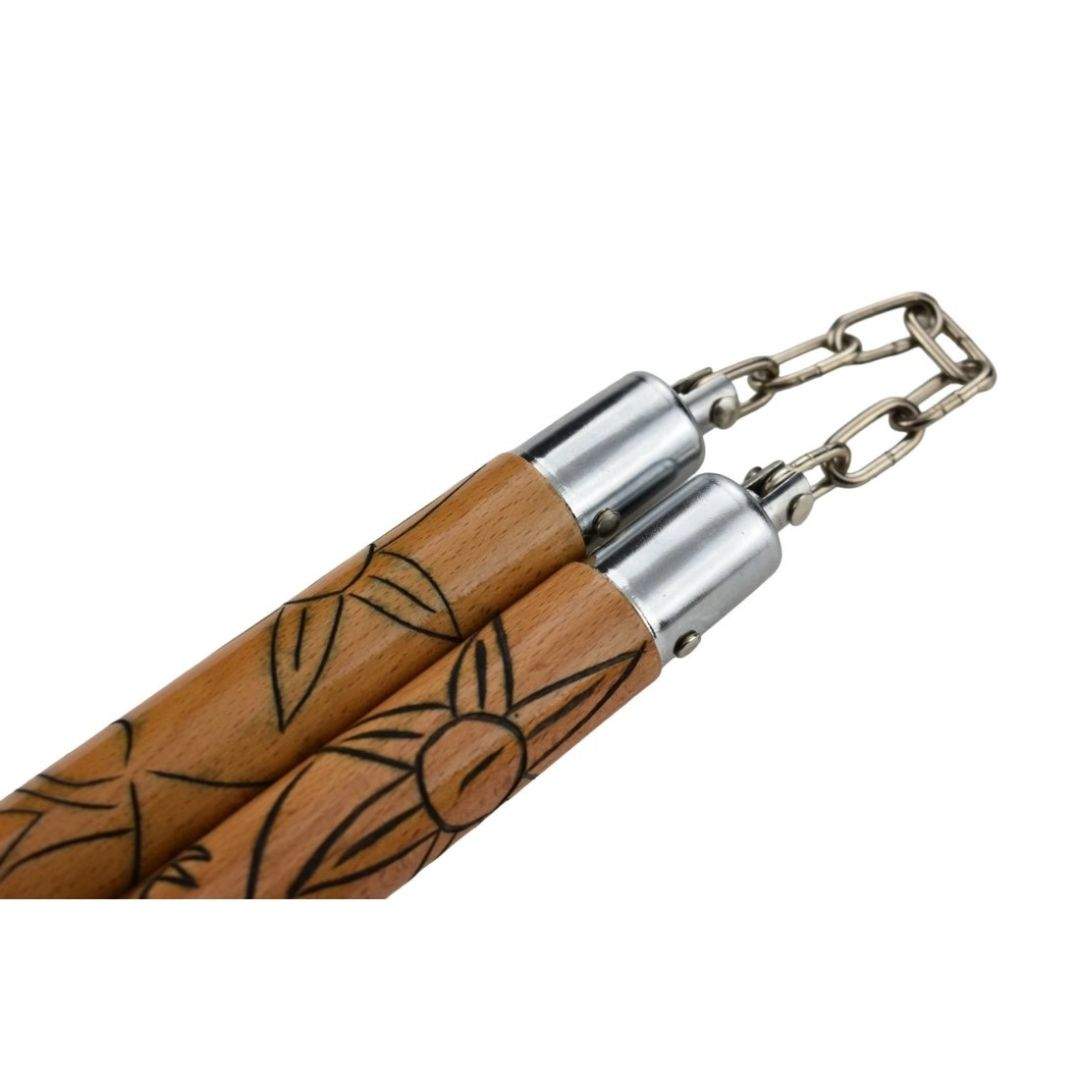 Traditional 30 cm beech wood nunchaku with engraved dragon design and metal chain connection