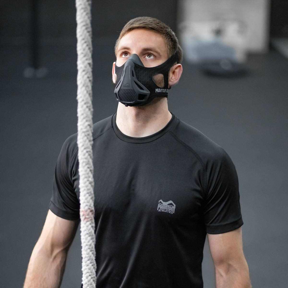 Masque d'Entraînement Phantom Athletics noir pour améliorer endurance et capacité pulmonaire en sports de combat