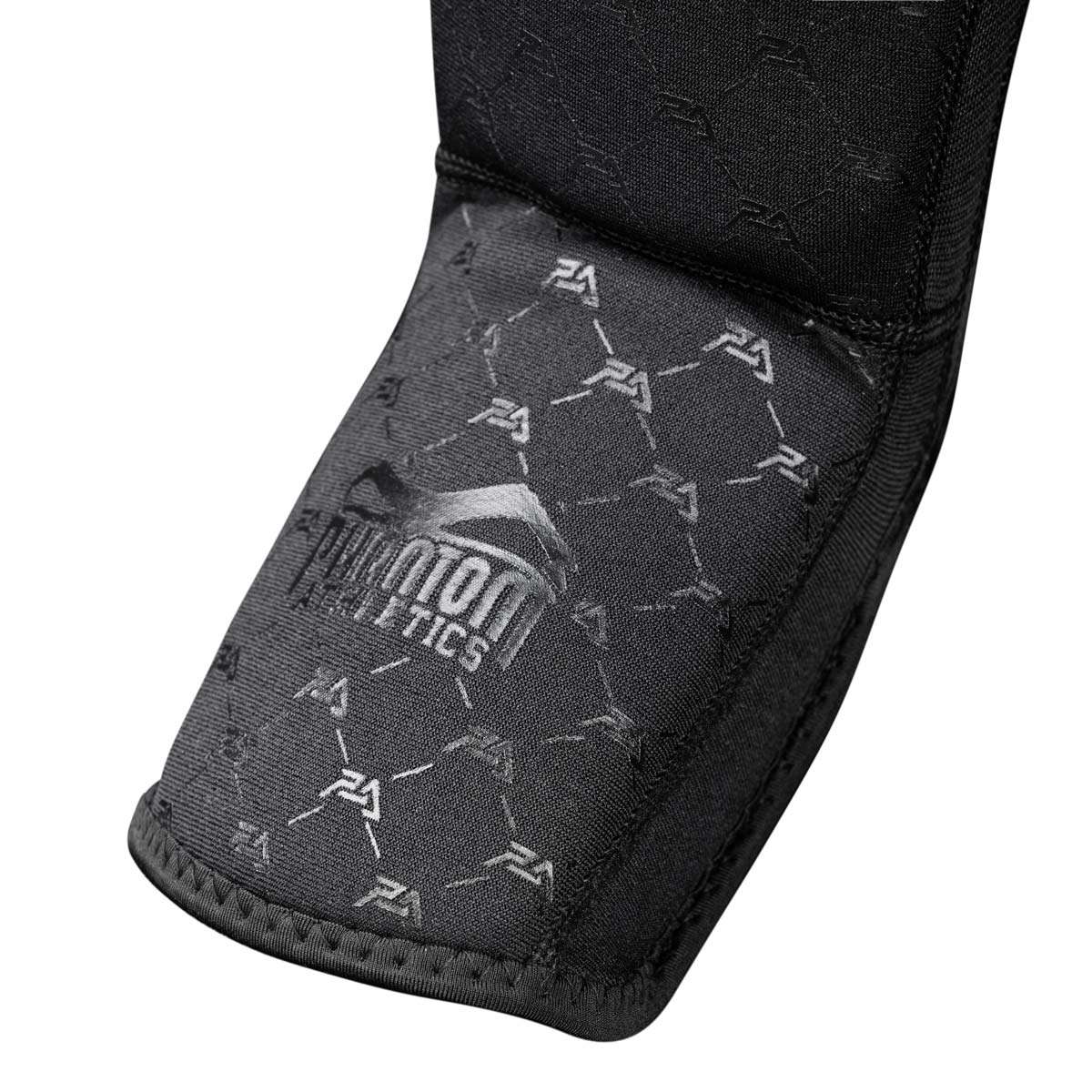 Protège-Tibias Grappling Elite Phantom Athletics noir, léger et flexible pour MMA et grappling, protection antidérapante et rembourrage haute densité.