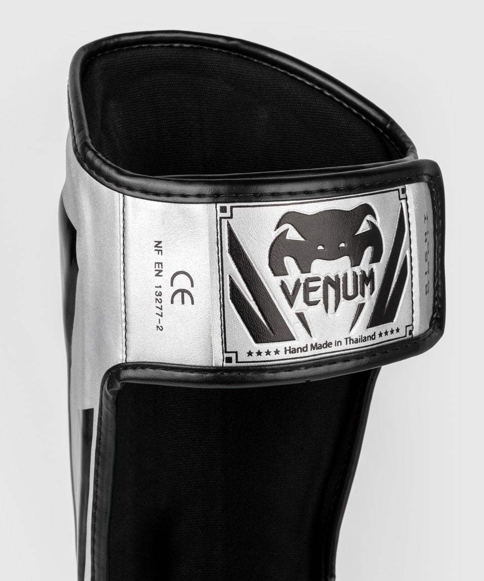 Protège-tibias Venum Elite argent et noir, mousse haute densité, protection maximale pour boxe et Muay Thaï