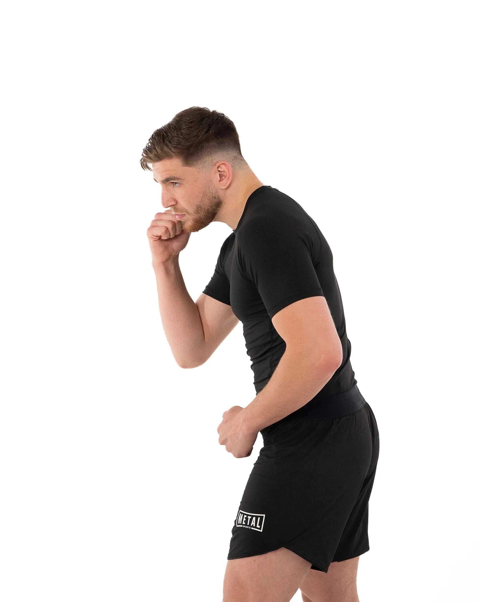 Rashguard Performance Metal Boxe noir, tissu technique respirant et coupe ajustée
