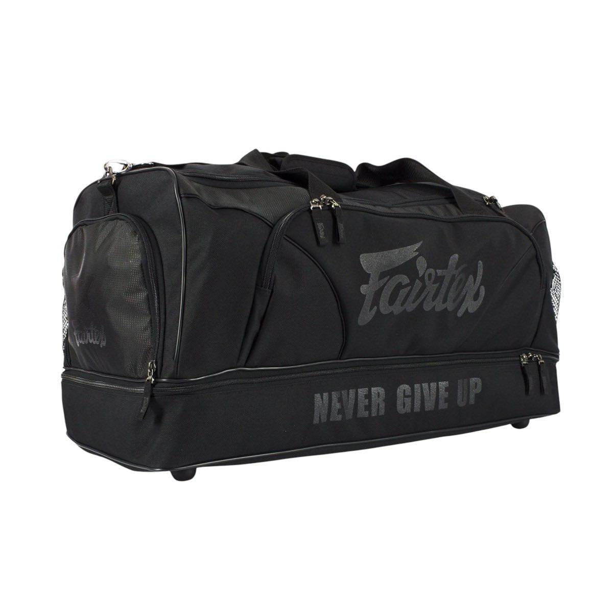 Sac de Sport Fairtex Premium noir et vert en nylon Rip Stop avec double fond et espace ventilé pour équipements humides, dimensions 72x36x32 cm.