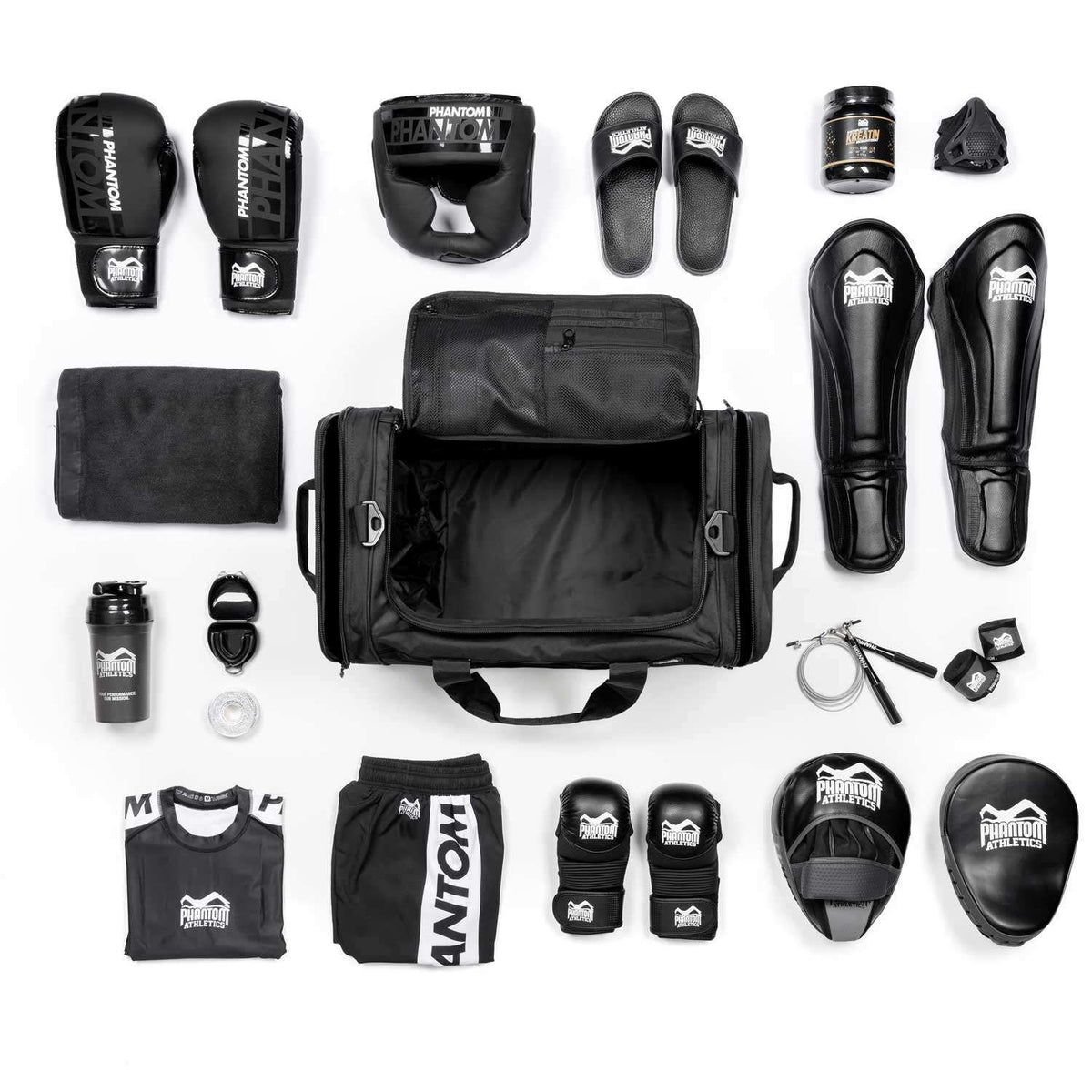 Sac de sport Tactic Phantom Athletics noir en nylon 1000D résistant 70L, poche humide et système MOLLE pour arts martiaux et sports de combat.