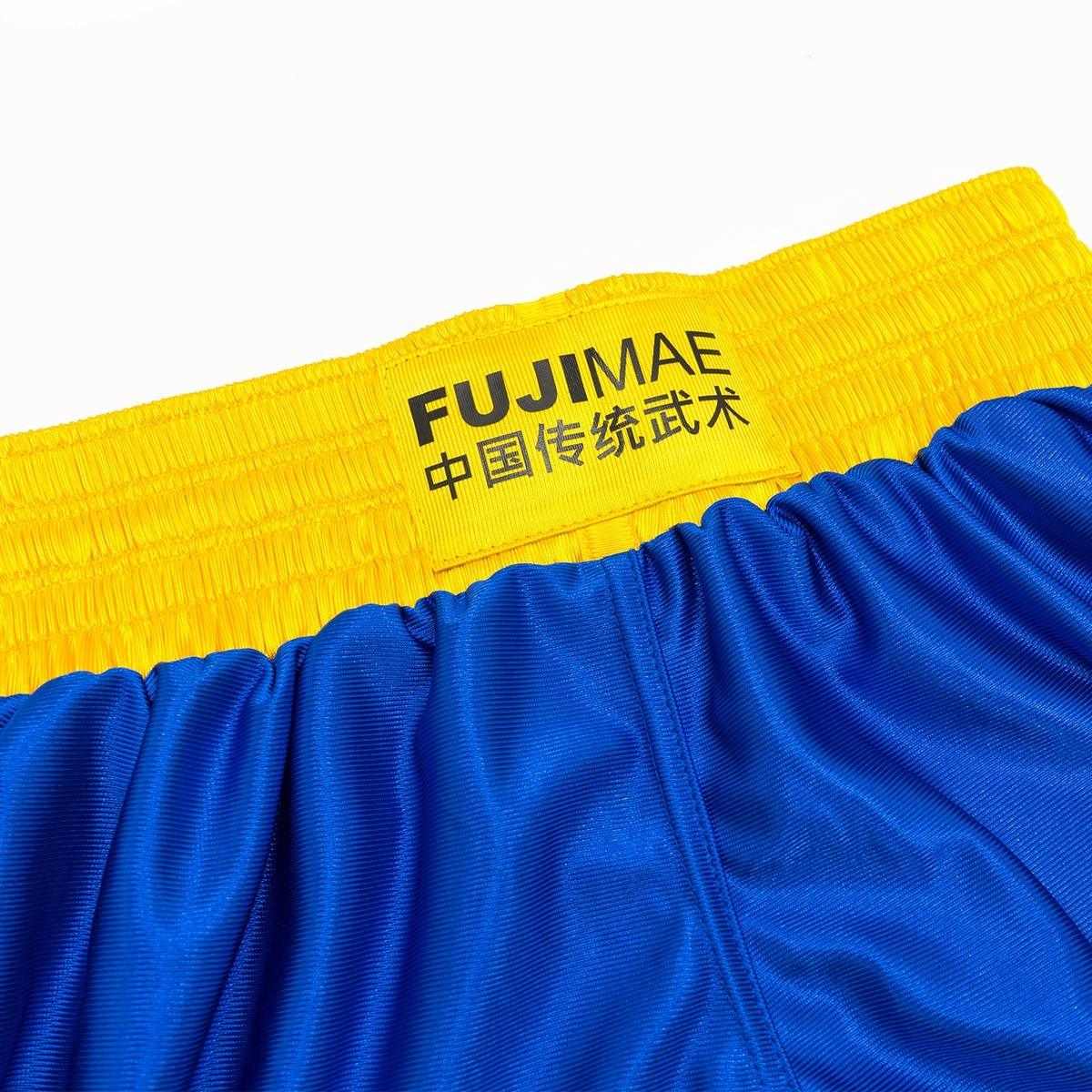Blue and yellow FUJIMAE Sanda training shorts with elastic waistband and breathable fabric