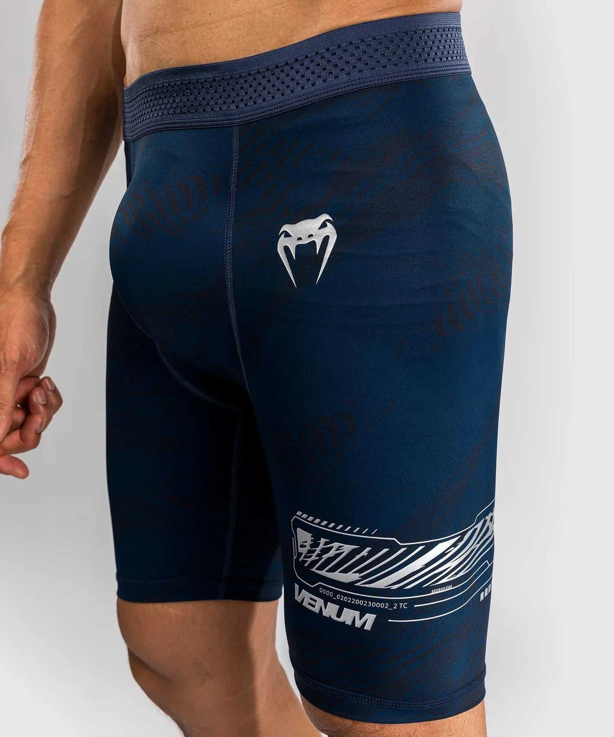 Men's navy blue UFC Fusion by Venum Vale Tudo compression shorts with elastic waistband and printed logos