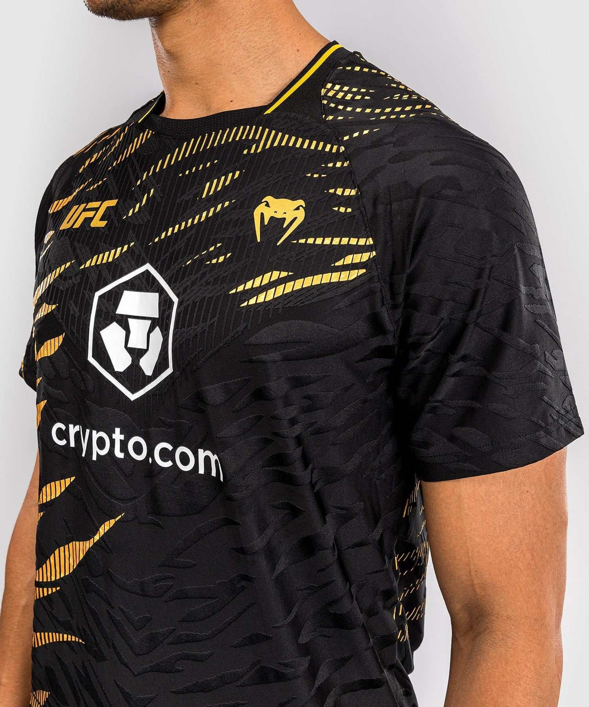 Black and gold UFC Fusion par Venum Dry-Tech performance T-shirt with UFC and crypto.com logos