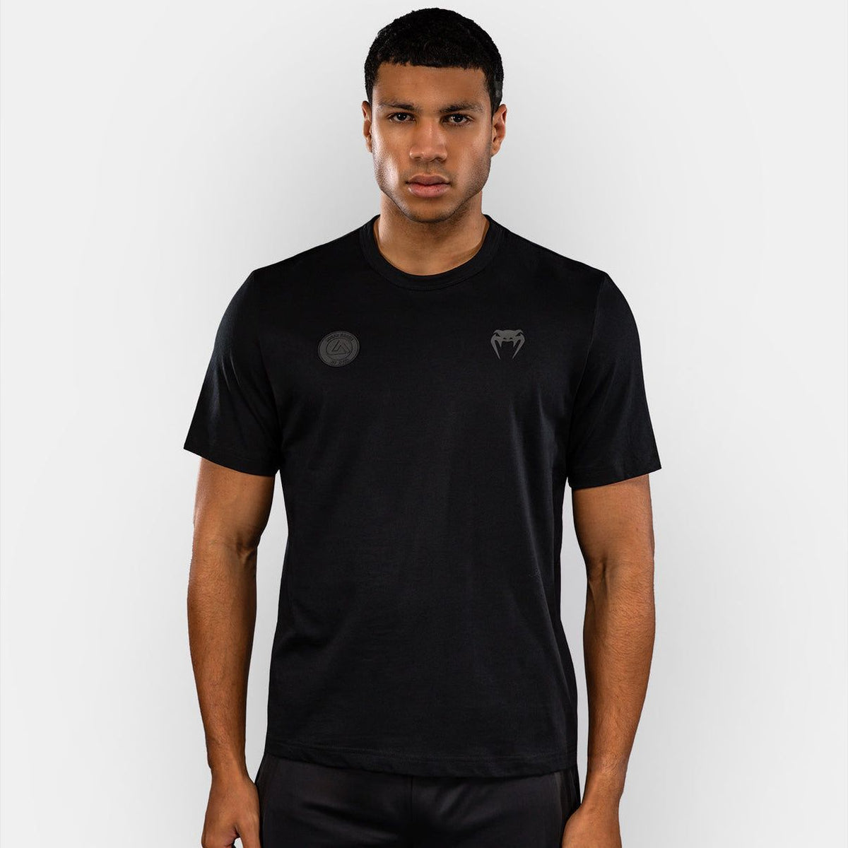 T-shirt Venum noir manches courtes en coton premium avec logo Roger Gracie Academy, style sport et jiu-jitsu brésilien