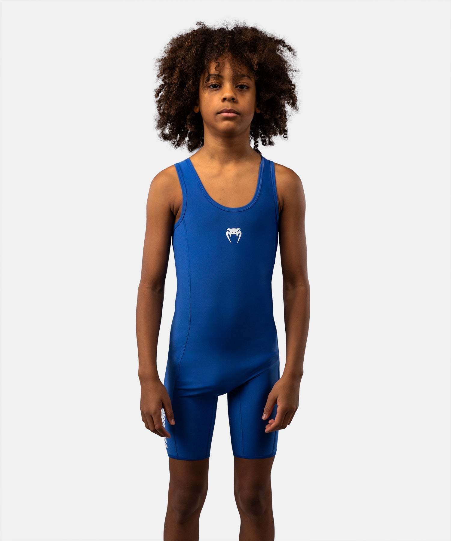 Tenue de lutte Venum enfant en tissu extensible pour performance et confort en lutte et grappling.