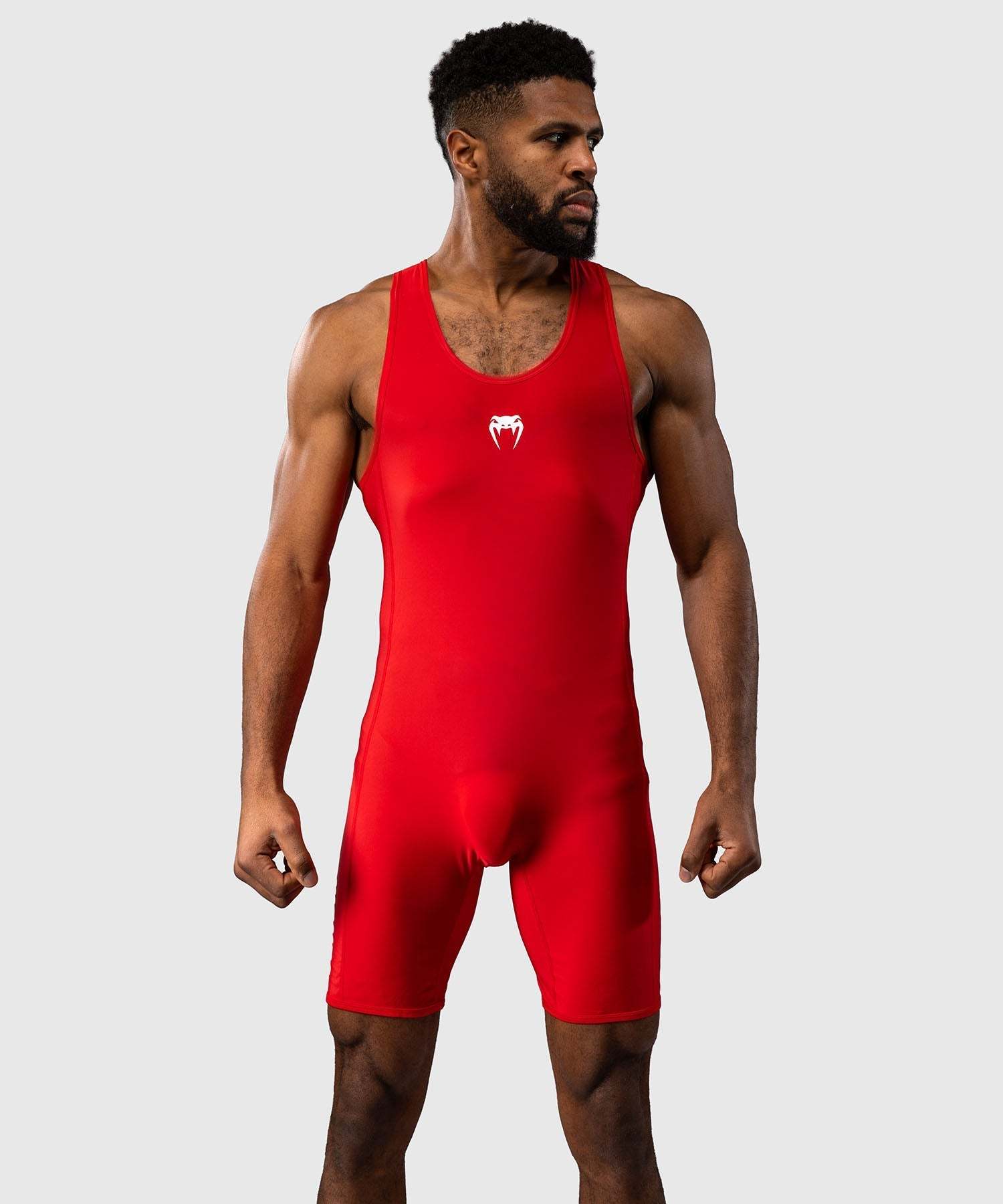 Combinaison de lutte homme Venum noire, tissu compressif, séchage rapide, design sans manches pour mobilité optimale