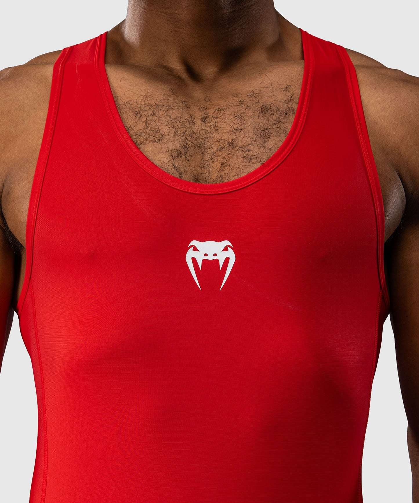 Combinaison de lutte homme Venum noire, tissu compressif et extensible, coupe ajustée sans manches pour entraînement et compétition