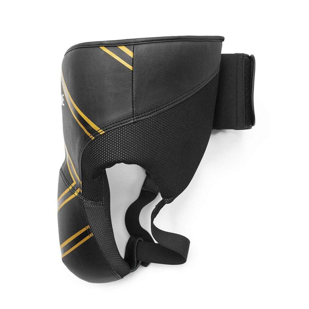 Professional boxing sparring cup Fujimae with dense foam protection, synthetic leather, adjustable velcro strap, and breathable mesh lining for comfort and safety during training