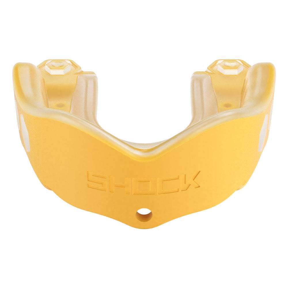 Protège-dents Shock Doctor jaune translucide, en matière souple, avec relief moulé et orifice central visible.