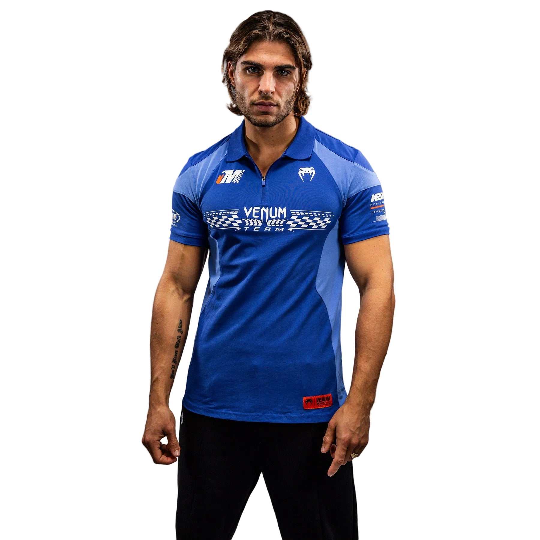 Polo Venum Motorsport bleu royal en coton à col zippé et manches courtes avec patchs motorsport.