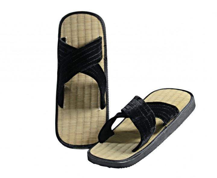 Zori Kwon sandals with crossed X-shaped black straps and rice straw footbed for comfort and grip