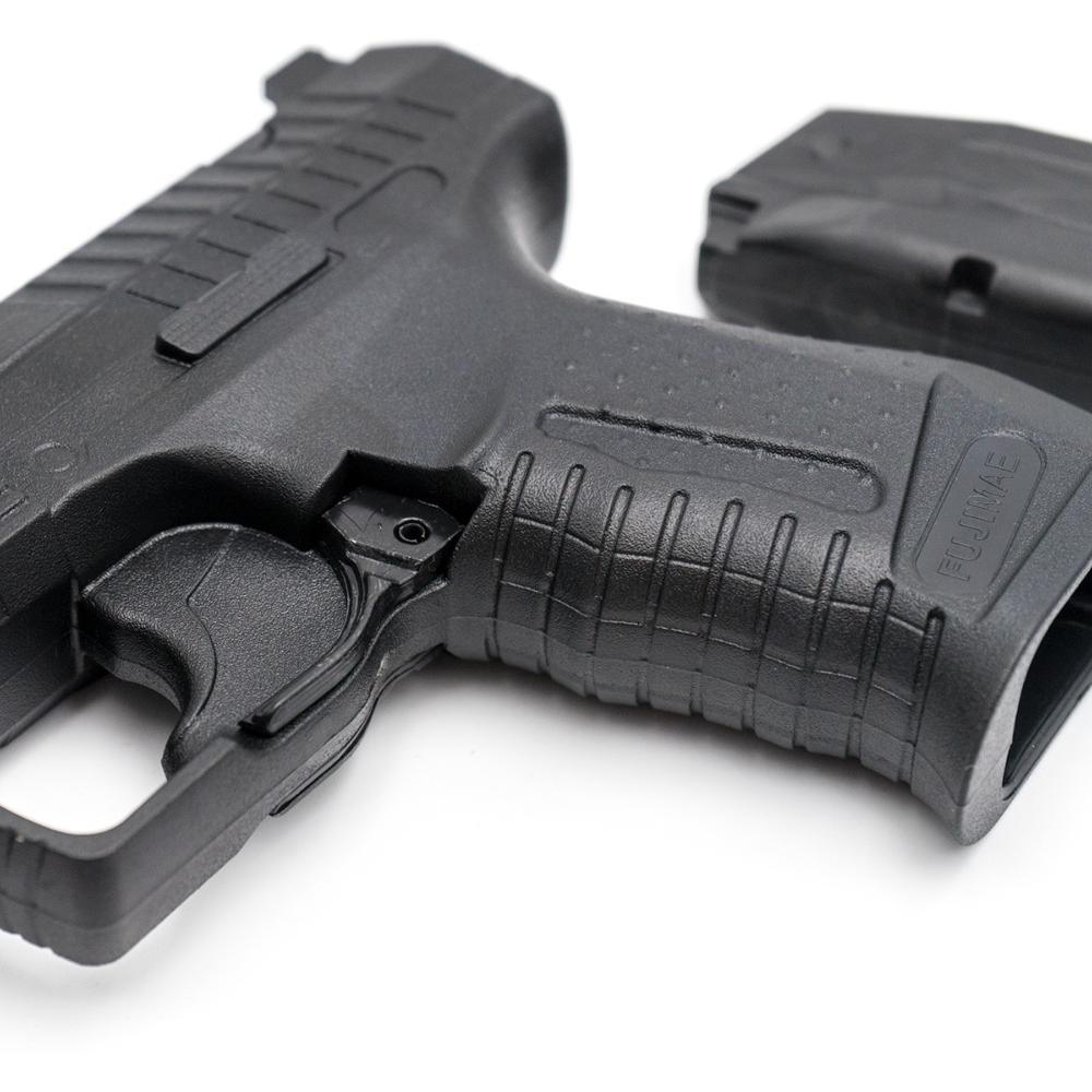 Black realistic training replica of Walther P99 self-defense pistol with removable magazine by FUJIMAE, made of durable polypropylene rubber.